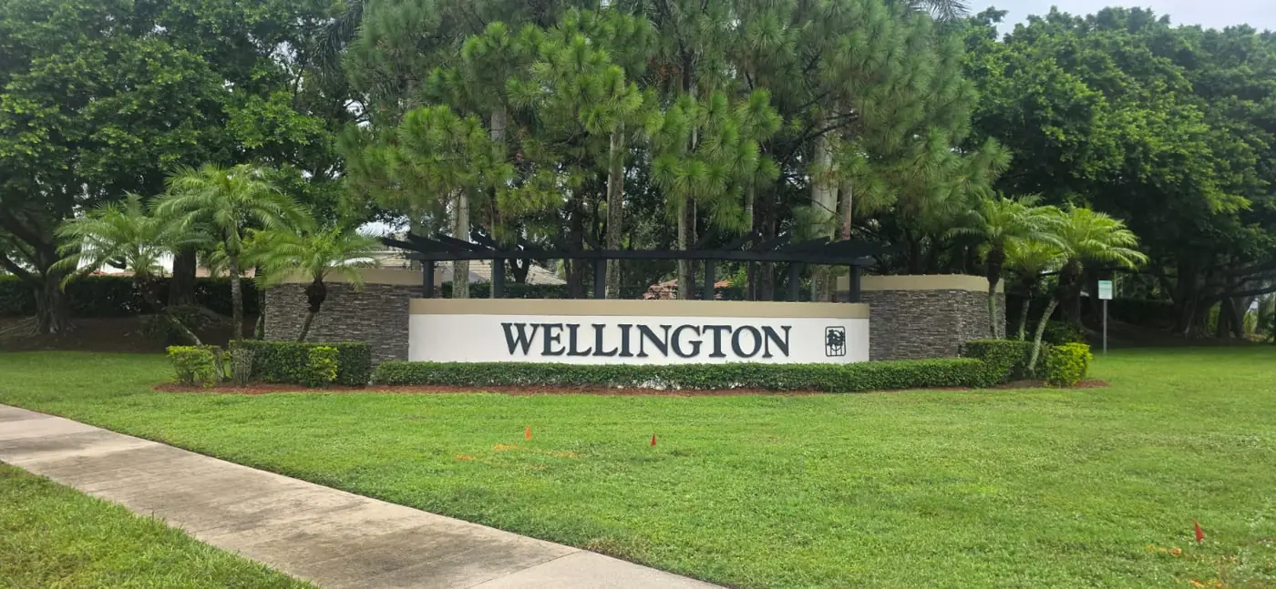 Wellington community entrance sign in Palm Beach County, an area Gate Core Automation serves
